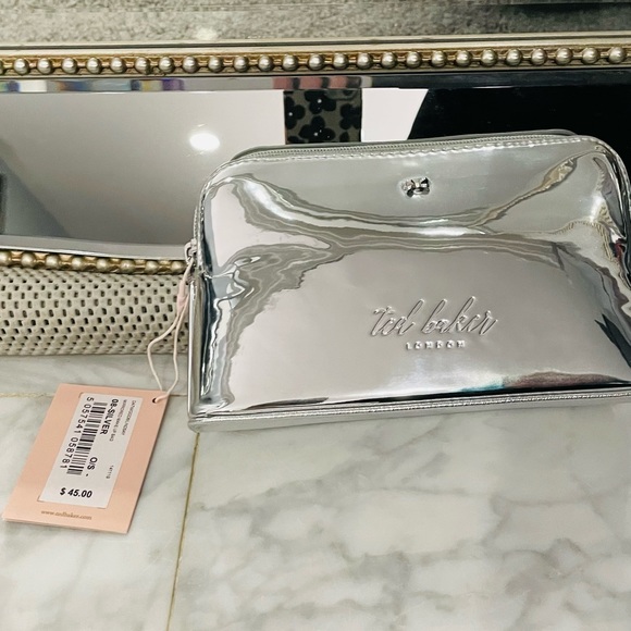 Ted Baker London Handbags - Ted Baker London Silver Travel Bag